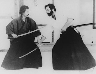 Mitsuzuka Sensei and Sylvain Sensei performing kumitachi